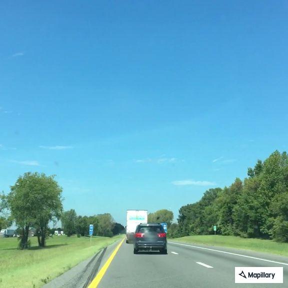Pedestrian walking wrong way on I-24 east