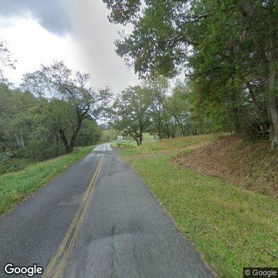 Tree partially blocking lane on Crooked Creek Road