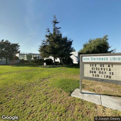 Person in wheelchair with leg infection at library