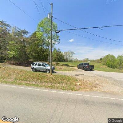 Woman walking along Highway 90 near Murphy Road