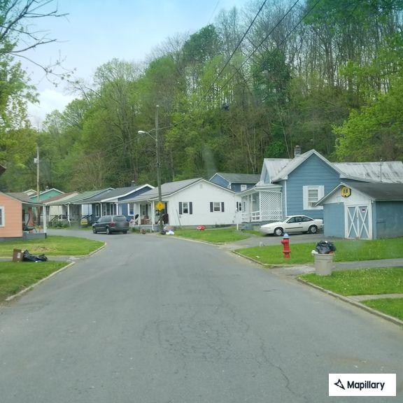 Orange smoke reported near Canton Street and Pearl Avenue