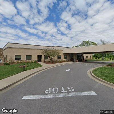 Person lying in facility driveway in Bowling Green