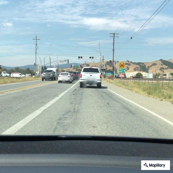 Driver in white Honda Civic reported driving recklessly
