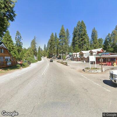Vehicle backs into building near Shaver Lake