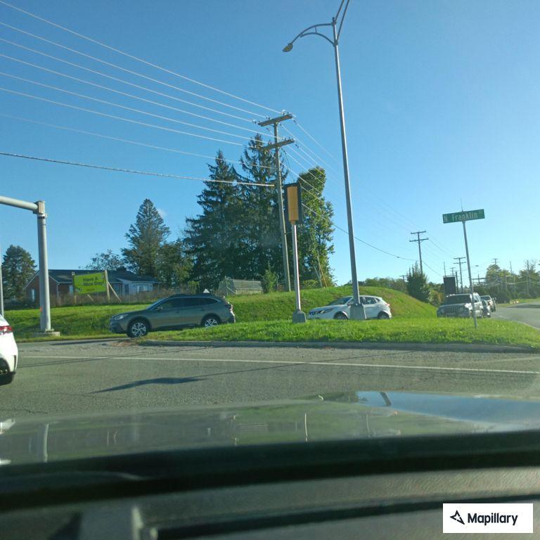 Large metal debris blocking intersection