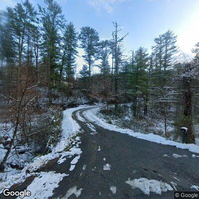 Large boulder blocking roadway on Hill Chestnut Road