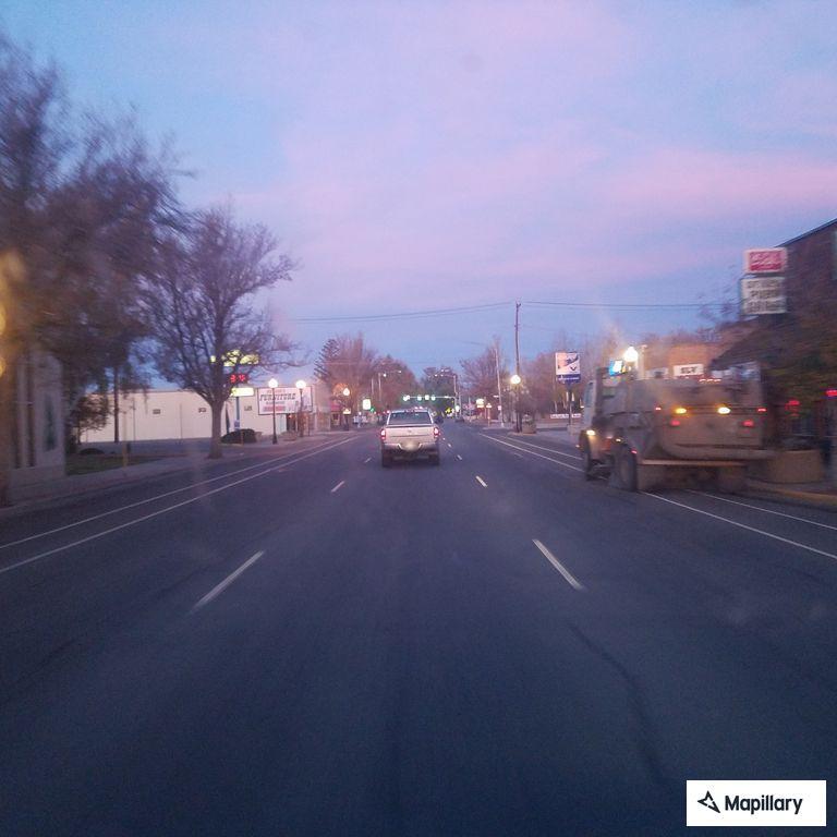 Traffic stop on silver Jeep Wagoneer on Main St