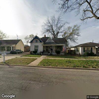 Person experiencing back pain near E Mulvane St