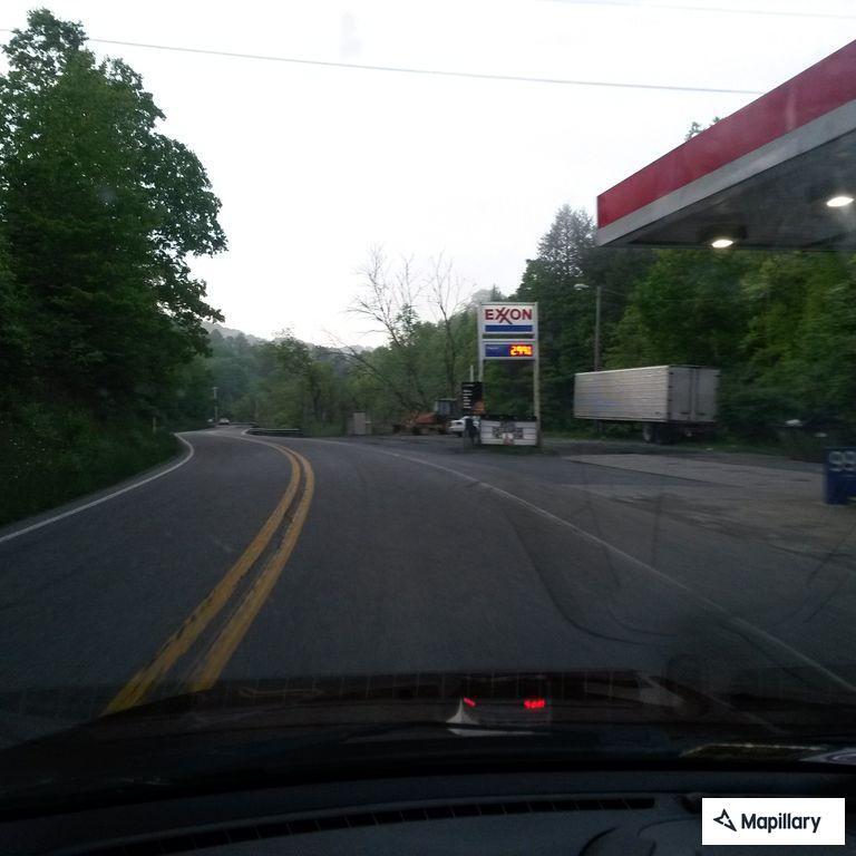 Disabled vehicle at gas station on Route 10