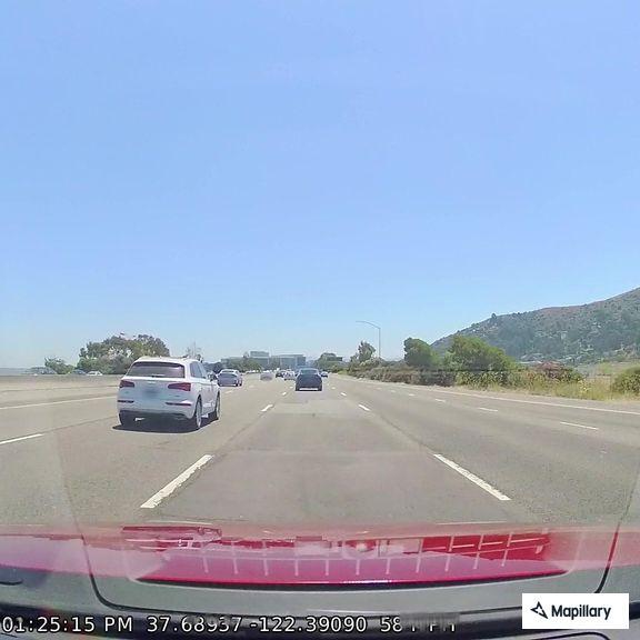 Airport shuttle bus displays emergency sign on Highway 101