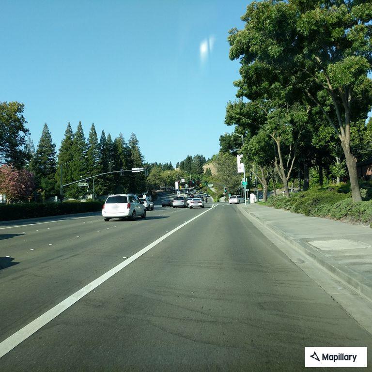 Reckless maroon sedan speeding on southbound 680