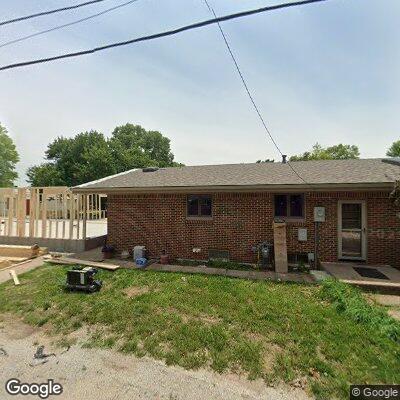 Person experiencing severe back pain near Sherman Street