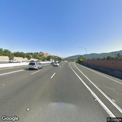 Motorcycle stopped on I-680 shoulder near Stone Valley