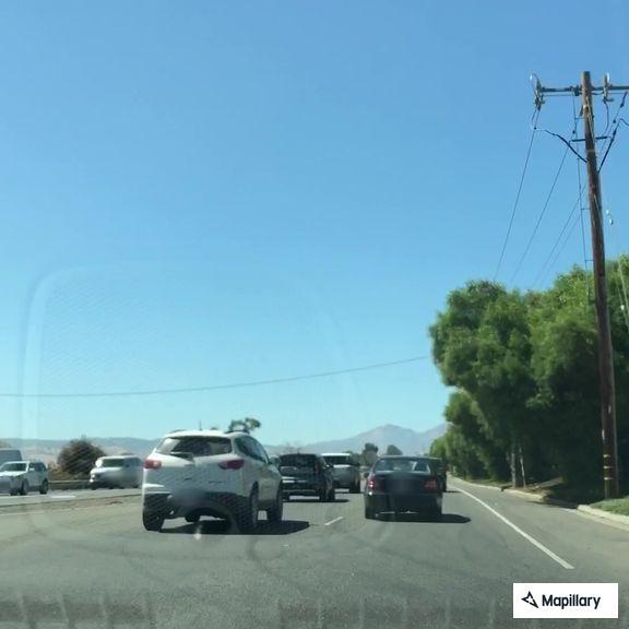Reckless driver in white SUV on Highway 4