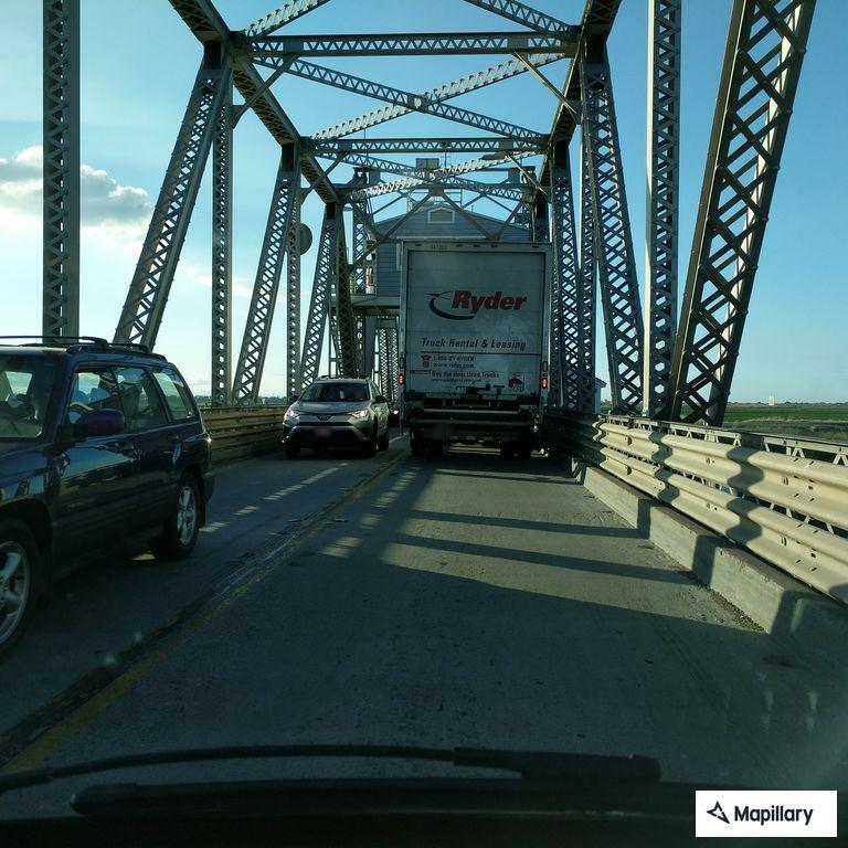 Unsafe passing by blue Honda on Route 4