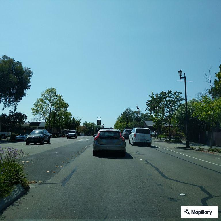Person injured after fall from embankment by freeway