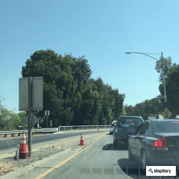Erratic silver Honda swerving on Highway 12