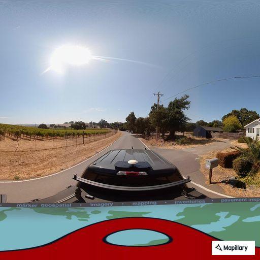 Car blocking water meter vault on highway off-ramp