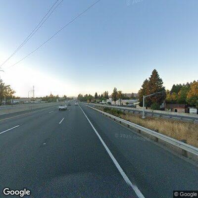 Two cars racing at high speed on Highway 101