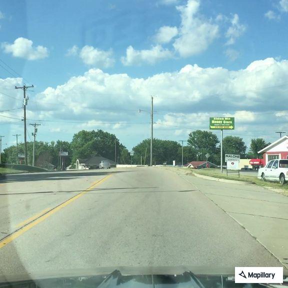 Sports car speeding and weaving through Eldon traffic