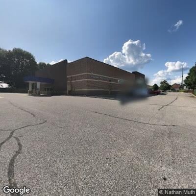 Man urinating on Family Dollar building