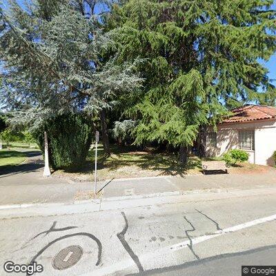 Person with difficulty breathing at bus stop on Santa Rosa Ave