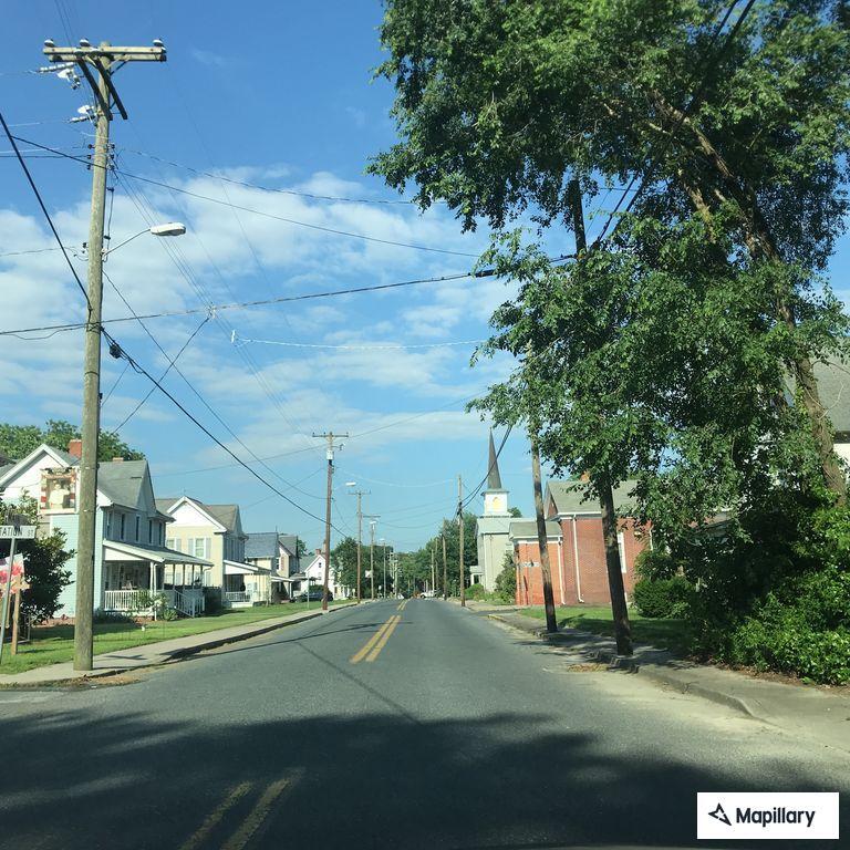 Person experiencing chest pain near Main Street and Church Street
