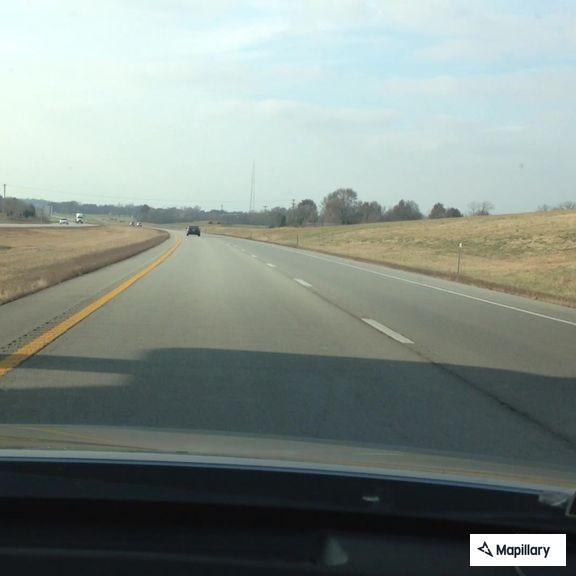 Erratic driving by maroon Toyota on Highway 7