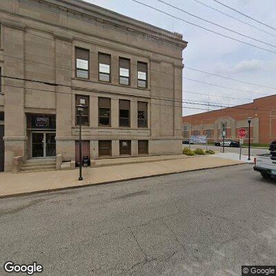Woman reports battery at police station