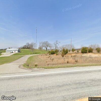 Tree partially blocking State Road 135 roadway