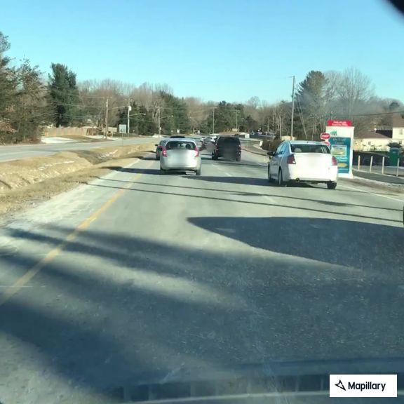 Disabled car in median at Fairfax Station intersection