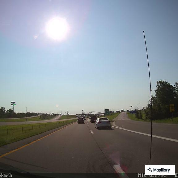 Stranded sedan blocking right lane on I-70