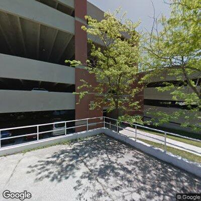 Non-urgent medical call near parking garage entrance