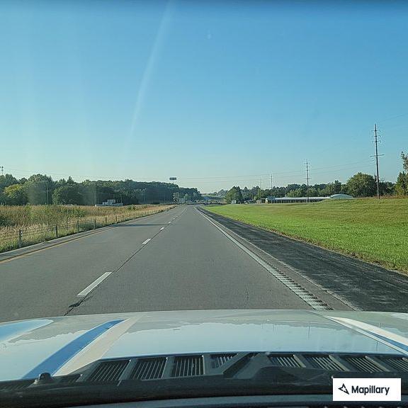 Man throwing alcohol on cars near US 61 off-ramp