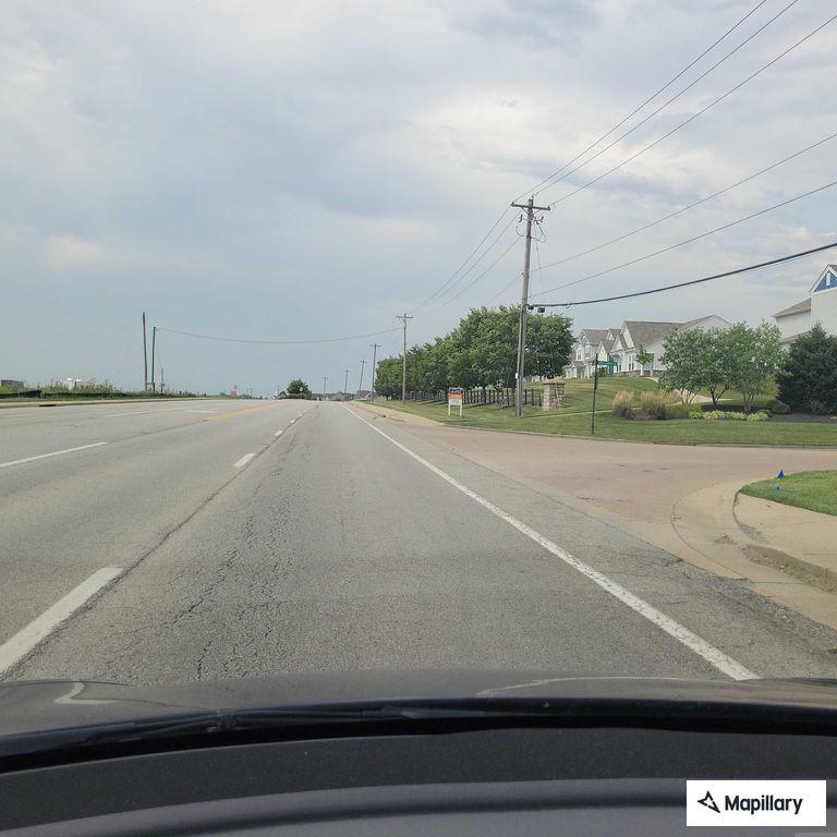 Elderly driver reported driving in wrong lane