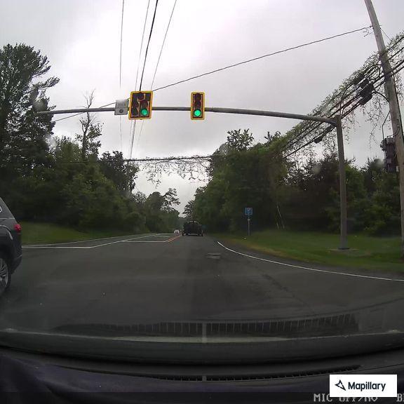 Reckless driver passing cars over double yellow