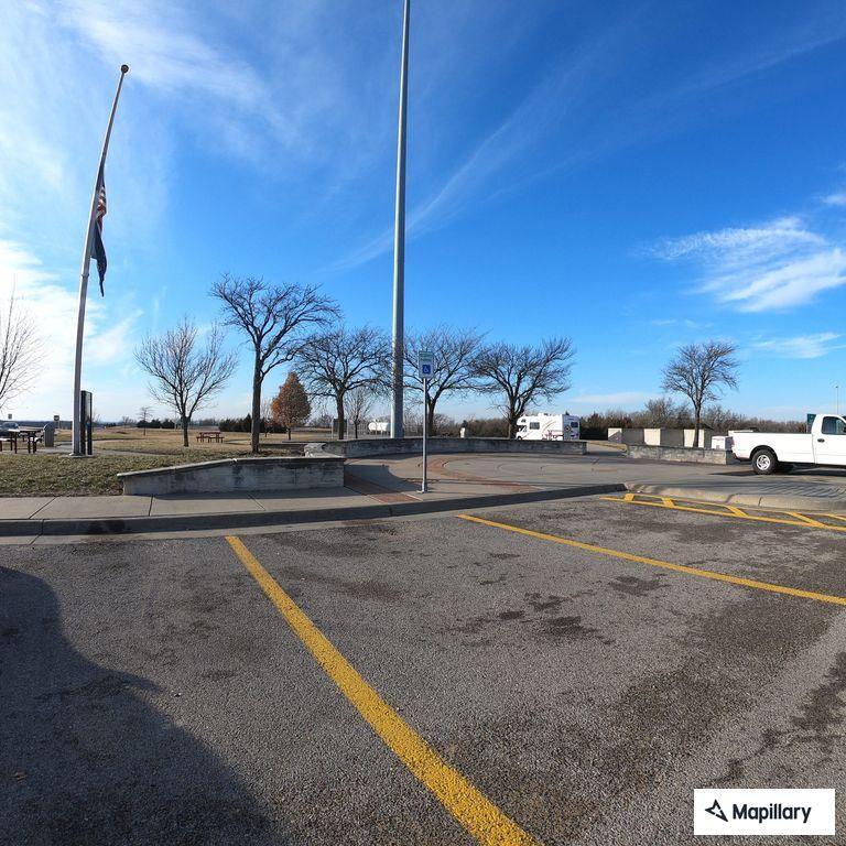Person suspected of heat stroke in parking lot