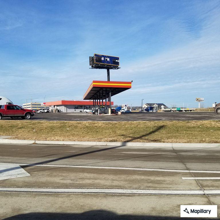 Suspicious vehicle watching people at store