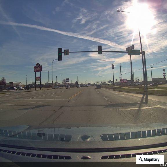 Officer checks white Toyota Highlander at Keller