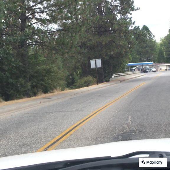 Person suffering from back pain on Ridge Road