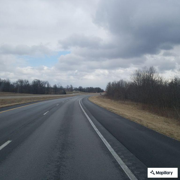 Motorcyclist weaving through traffic on US 63