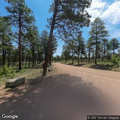 Ranger transports patient from trail to trailhead