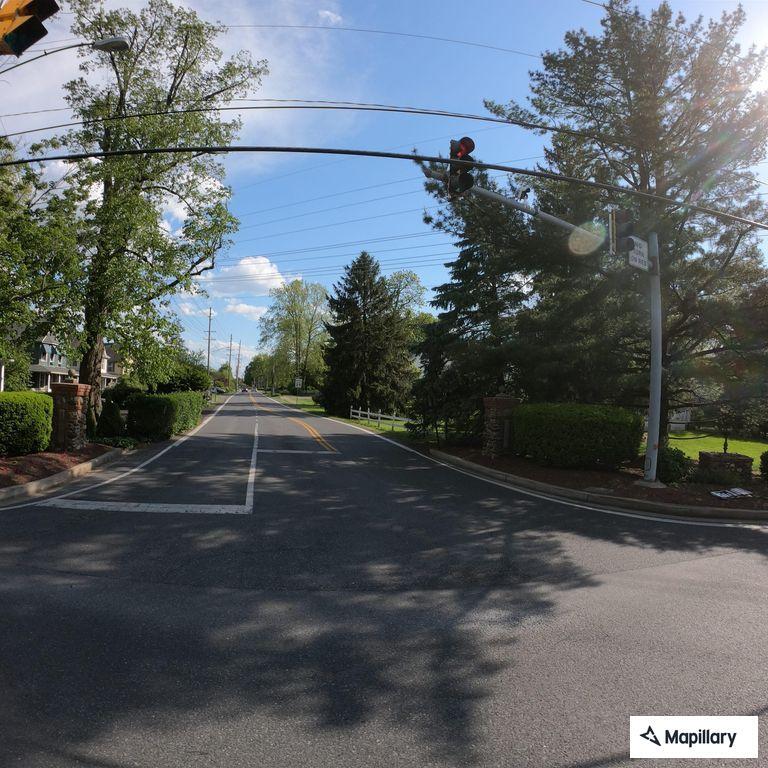 Car blocking road with unresponsive driver