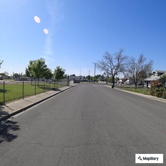 Neighbor repeatedly follows woman and her son