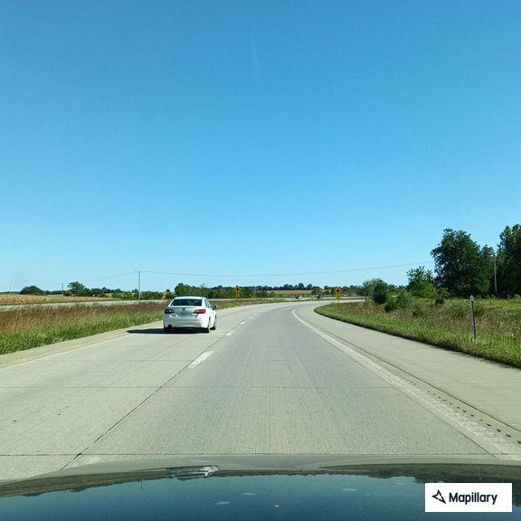 Car stopped in passing lane during tire change