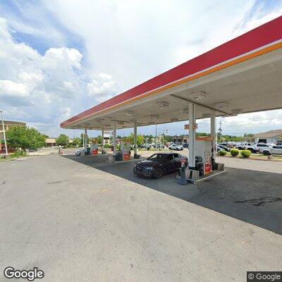 Person experiencing difficulty breathing at gas station