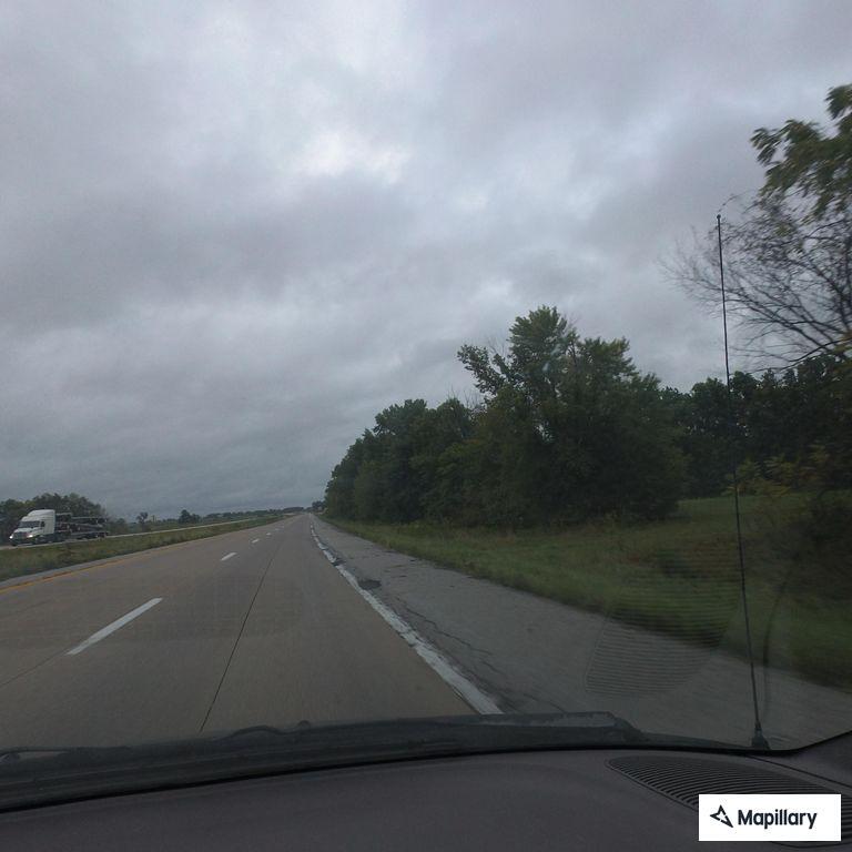 Abandoned car on US 36 shoulder near Hunnewell