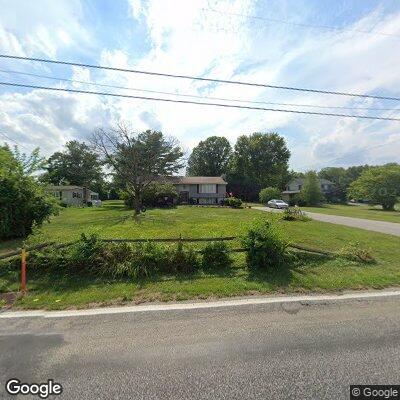Person experiencing abdominal pain near Pine Road