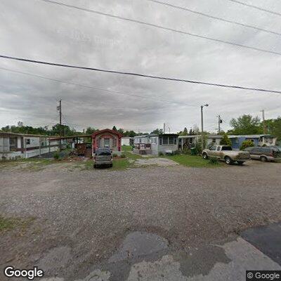 Trash fire near trailer in mobile home park