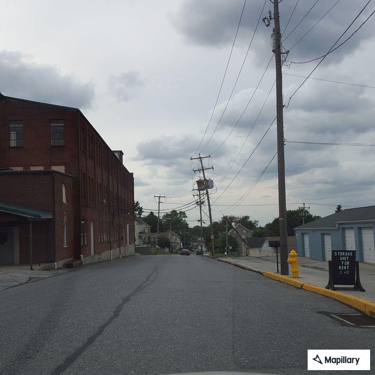 Person experiencing abdominal pain at (number withheld) E Broad St